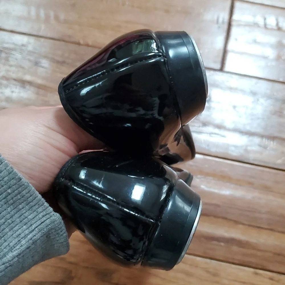 Black patent tap dance shoes